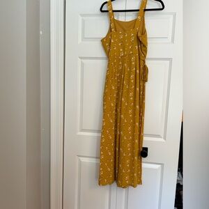 Francesca’s lined romper. Yellow floral. Size large, petite.